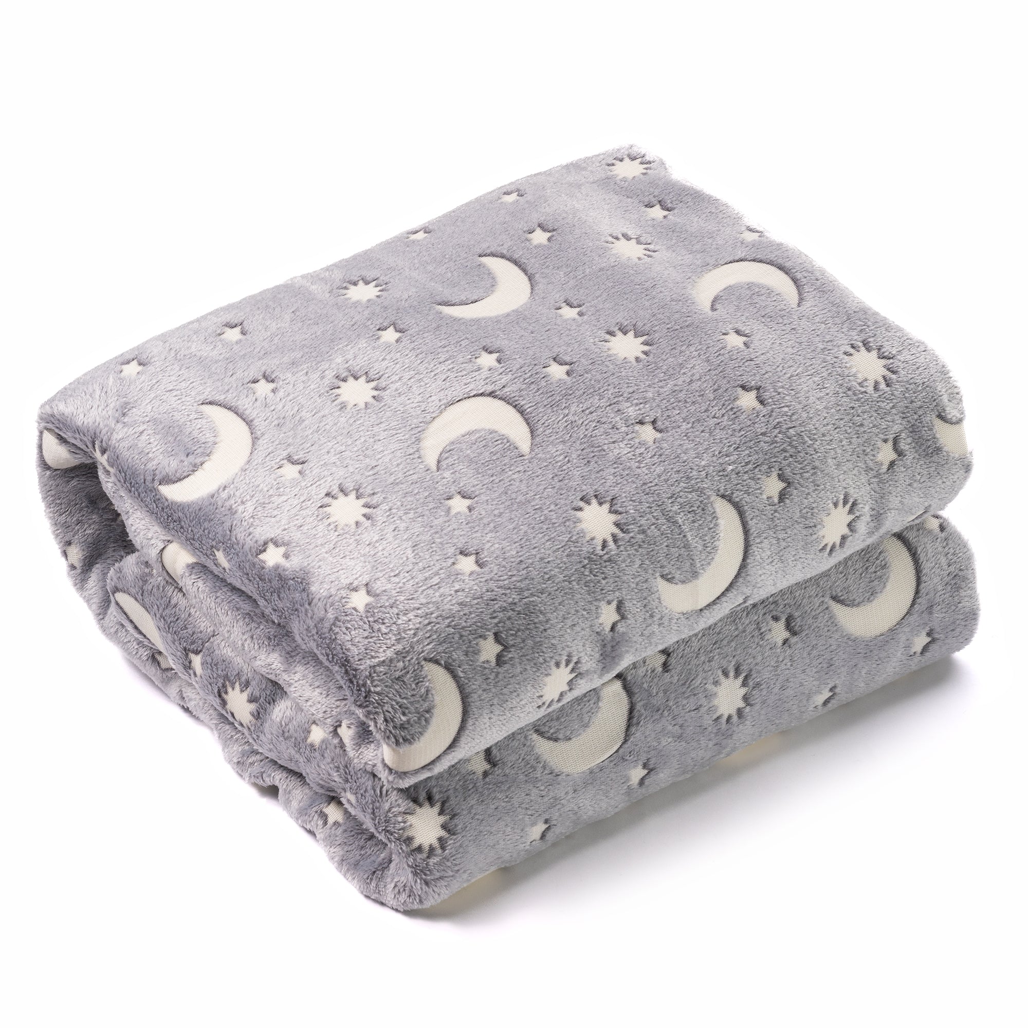 Stars and moon blanket neatly folded white background